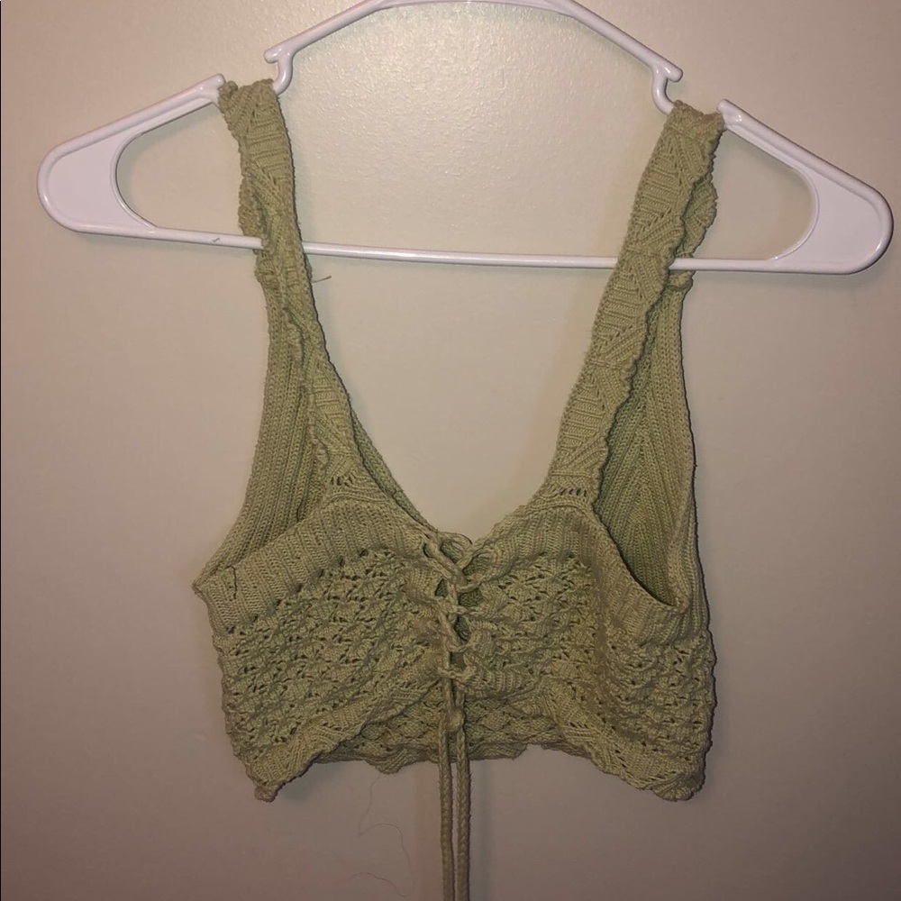 green knit top
